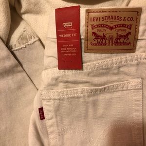 Levi’s white distressed denim